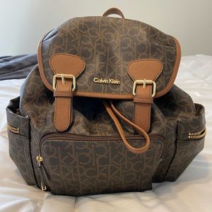 Calvin Klein Double Buckle Monogram Backpack